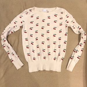 Urban Outfitters cherry print sweater.